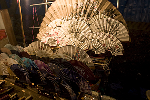 Paper fans on display at the night market.