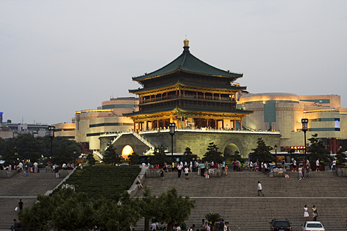 The Bell Tower in Xian lit up at sunset.