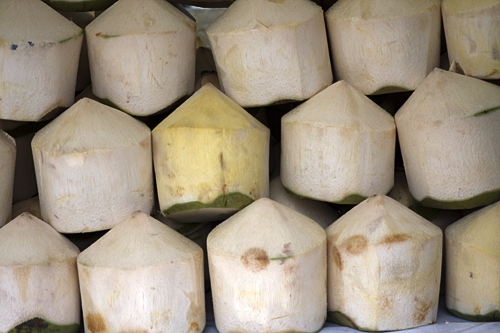 Stacked coconuts ready for drinking