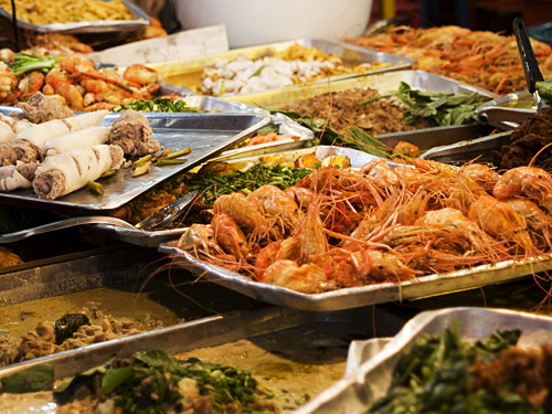 Trays of seafood at a food vendor