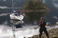 Dan eating oysters on the beach.