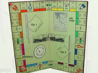 Image of WWII Monopoly board with tools hidden.