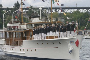 Lovely classic wooden boat with officers